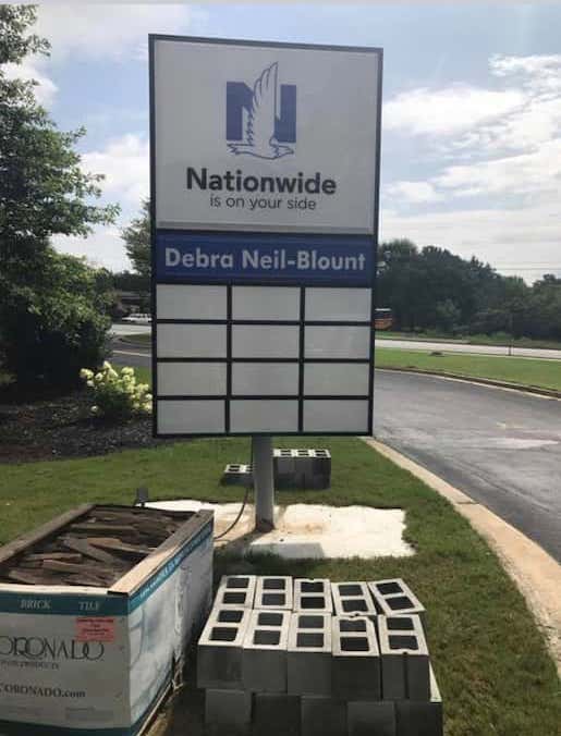 commercial sign with natural stone